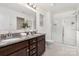 The primary bathroom features dual sinks, and a glass enclosed shower at 165 Clove Hitch Dr # I281, Statesville, NC 28677