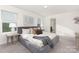 Comfortable bedroom featuring a plush bed, warm neutral colors, and soft, natural light at 165 Clove Hitch Dr # I281, Statesville, NC 28677