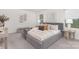 Serene bedroom with neutral color palette, comfortable bed, and soft lighting at 165 Clove Hitch Dr # I281, Statesville, NC 28677
