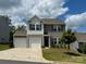 Charming two-story home with a two-car garage and well-manicured lawn in a peaceful neighborhood at 165 Clove Hitch Dr # I281, Statesville, NC 28677
