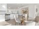 Bright eat-in kitchen with stainless appliances, white cabinets, and stylish decor at 165 Clove Hitch Dr # I281, Statesville, NC 28677