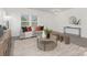 Cozy living room with comfortable seating, natural light, and modern decor at 165 Clove Hitch Dr # I281, Statesville, NC 28677