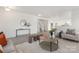Bright living room with modern furnishings, neutral colors, and a cozy area rug at 165 Clove Hitch Dr # I281, Statesville, NC 28677