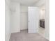 Walk-in closet with plenty of space for clothes and a view to the bathroom at 165 Clove Hitch Dr # I281, Statesville, NC 28677
