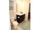 Bright and modern bathroom features a stylish vanity and a comfortable toilet area at 1727 Grace Ln, Charlotte, NC 28262