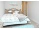 Comfortable bedroom features a cozy bed, bedside table, and elegant wall decor at 1727 Grace Ln, Charlotte, NC 28262