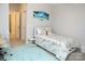 Comfortable bedroom featuring a stylish bed frame, soft rug, and ample natural light at 1727 Grace Ln, Charlotte, NC 28262