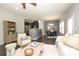 Open living area with hardwood floors, modern decor, and seamless flow into the kitchen and dining space at 1809 Evergreen Dr, Charlotte, NC 28208