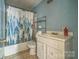 Bathroom with standard vanity and shower-tub combo at 1908 5Th St, Statesville, NC 28677