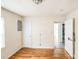 Bedroom featuring beautiful hardwood floors, and two entryways at 1908 5Th St, Statesville, NC 28677