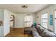 View of the living room with hardwood floors and white vertical paneled walls at 1908 5Th St, Statesville, NC 28677