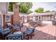 Spacious deck with ample seating, perfect for entertaining, with a brick chimney accent at 195 Brookfield Cir, Mooresville, NC 28115