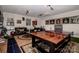 Spacious basement with a ping pong table, couches, and sports memorabilia at 195 Brookfield Cir, Mooresville, NC 28115