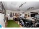 Finished basement with a ping pong table, golf simulator and bar area at 195 Brookfield Cir, Mooresville, NC 28115