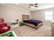 Bedroom with neutral walls, carpet flooring, a ceiling fan and natural light at 195 Brookfield Cir, Mooresville, NC 28115