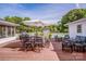 Expansive wooden deck with outdoor dining and lounge areas overlooking the backyard at 195 Brookfield Cir, Mooresville, NC 28115