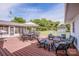 Large wooden deck perfect for outdoor gatherings with ample seating and a grill at 195 Brookfield Cir, Mooresville, NC 28115