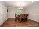 Dining room features wood table and hardwood floors at 195 Brookfield Cir, Mooresville, NC 28115