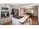 Open-concept kitchen with stainless steel appliances and center island at 195 Brookfield Cir, Mooresville, NC 28115