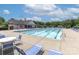 Community pool features a large swimming area with plenty of lounge chairs and seating for residents at 212 Forest Walk Way, Mooresville, NC 28115
