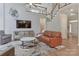 Spacious living room showcases contemporary design elements, a statement rug, and sleek furniture at 212 Forest Walk Way, Mooresville, NC 28115