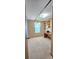 A bedroom with a built-in desk and shelving offers both study and storage at 217 Eighth Ave, New London, NC 28127