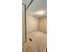 Carpeted bedroom provides a cozy space with neutral-toned walls and a simple design at 217 Eighth Ave, New London, NC 28127