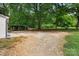 Spacious backyard with gravel area, outbuilding and a carport at 2376 S Us 321 Hwy, Newton, NC 28658