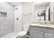Bathroom with tiled walk-in shower, toilet, and vanity at 2376 S Us 321 Hwy, Newton, NC 28658