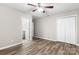 Bedroom with ceiling fan and access to an adjoining bathroom at 2376 S Us 321 Hwy, Newton, NC 28658