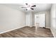 Bedroom with ceiling fan and access to an adjoining bathroom at 2376 S Us 321 Hwy, Newton, NC 28658