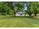 Charming home with mature trees, green lawn, and inviting curb appeal at 2376 S Us 321 Hwy, Newton, NC 28658