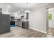Spacious kitchen featuring gray cabinets, granite countertops, and stainless steel appliances at 2376 S Us 321 Hwy, Newton, NC 28658