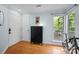 Bonus space featuring hardwood flooring, bright light, and neutral colored walls at 2502 Cranbrook Ln # 8, Charlotte, NC 28207
