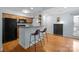 Cozy kitchen featuring a breakfast bar and stainless steel appliances at 2502 Cranbrook Ln # 8, Charlotte, NC 28207