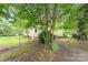 Spacious backyard with lush greenery, providing a private and serene outdoor space at 2556 Salem Church Rd, Lincolnton, NC 28092