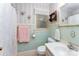 The bathroom features patterned wall paper, neutral tiling, and standard fixtures at 2556 Salem Church Rd, Lincolnton, NC 28092