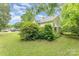 Charming home nestled among mature trees and manicured lawn at 2556 Salem Church Rd, Lincolnton, NC 28092