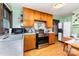 Functional kitchen featuring wood cabinets and stainless steel appliances at 2556 Salem Church Rd, Lincolnton, NC 28092