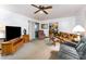 Bright living room features a ceiling fan, neutral paint, and comfortable seating at 2556 Salem Church Rd, Lincolnton, NC 28092
