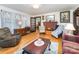 Comfortable living room with hardwood floors, fireplace, and ample seating at 2556 Salem Church Rd, Lincolnton, NC 28092