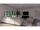 Comfortable living room with ample seating, a modern entertainment center, and neutral tones at 2601 Greenmont Cir, Belmont, NC 28012