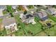 An aerial view showcases a home with solar panels surrounded by a well-manicured lawn at 3211 Gilroy Dr, Fort Mill, SC 29707