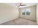 Bedroom with a window, ceiling fan and neutral carpet at 3211 Gilroy Dr, Fort Mill, SC 29707