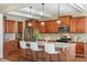 Gourmet kitchen with granite countertops, stainless steel appliances, and island with seating at 3211 Gilroy Dr, Fort Mill, SC 29707