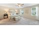 Inviting primary bedroom with natural light, tasteful decor, and a cozy ambiance for restful nights at 3211 Gilroy Dr, Fort Mill, SC 29707