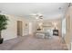Spacious primary bedroom with a ceiling fan, walk-in closet, and a serene decor for relaxation at 3211 Gilroy Dr, Fort Mill, SC 29707