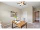 Well-lit home office with desk, chair, and artwork, creating a cozy and productive workspace at 3211 Gilroy Dr, Fort Mill, SC 29707