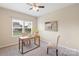 Bright office featuring a ceiling fan and a large window for natural light and comfortable work environment at 3211 Gilroy Dr, Fort Mill, SC 29707