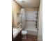 Bathroom with shower and tub combination, storage shelves, and sink at 3942 Benny Shrum Ln, Maiden, NC 28650